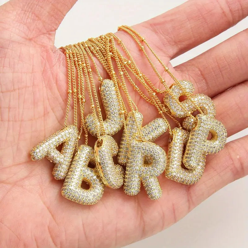 Conjunto de collar con letra de burbuja