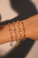 Pulsera con cruz de múltiples diamantes