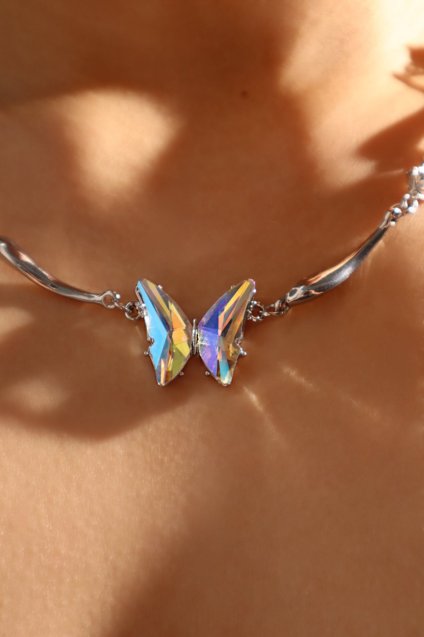 Cadena de mariposa de vidrio dichroico en acero inoxidable