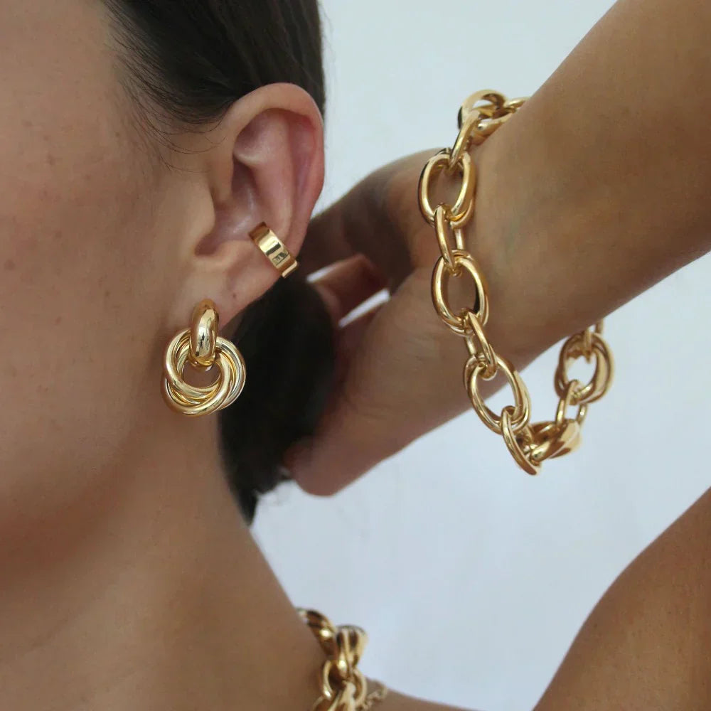 Pendientes entrelazados Statement