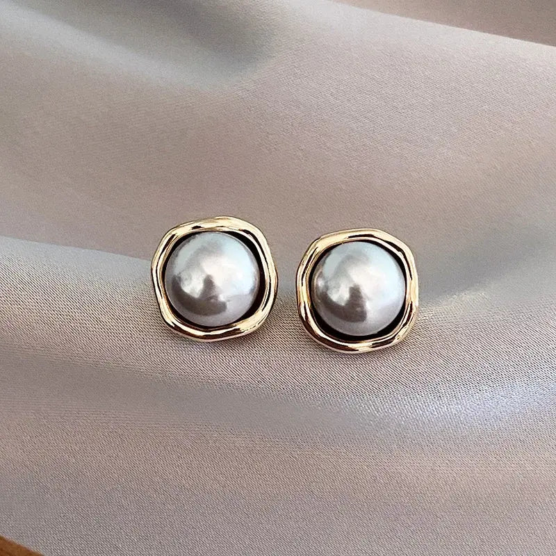 Pendientes elegantes de perlas negras