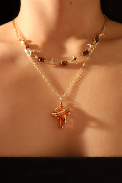 Collar con estrella marrón Tigerita