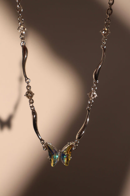 Cadena de mariposa de vidrio dichroico en acero inoxidable