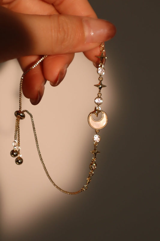 Pulsera con concha, luna y estrella