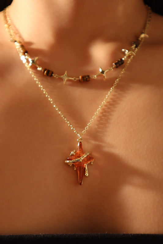 Collar con estrella marrón Tigerita