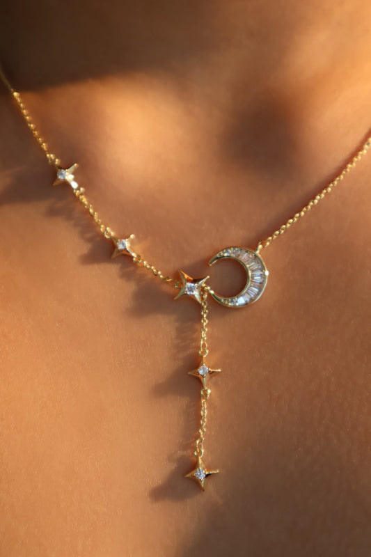 Collar con colgante de estrella y luna de diamantes