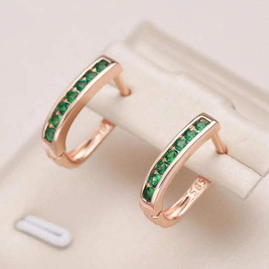 Pendientes de diamantes de esmeralda en oro