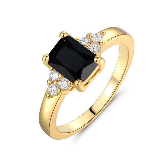 Anillo de espinela negra con baguettes