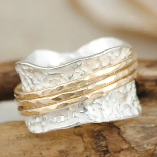 Anillo vintage giratorio delgado de oro y plata